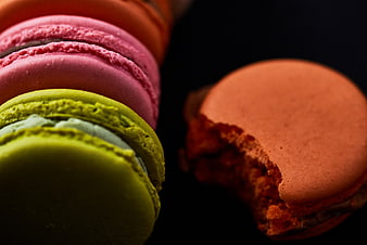 Colorful French Macarons Close Up on Dark Background