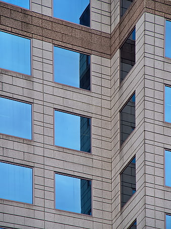 Modern Office Building Facade with Blue Windows
