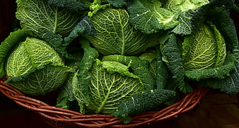 Fresh Savoy Cabbage Heads In Woven Wicker Basket