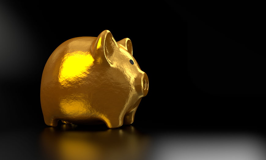 Golden Piggy Bank on Black Background for Finance