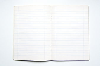 Open Vintage Lined Notebook on White Background