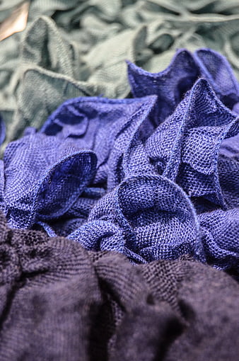 Close-up of purple and gray textured mesh fabric layers
