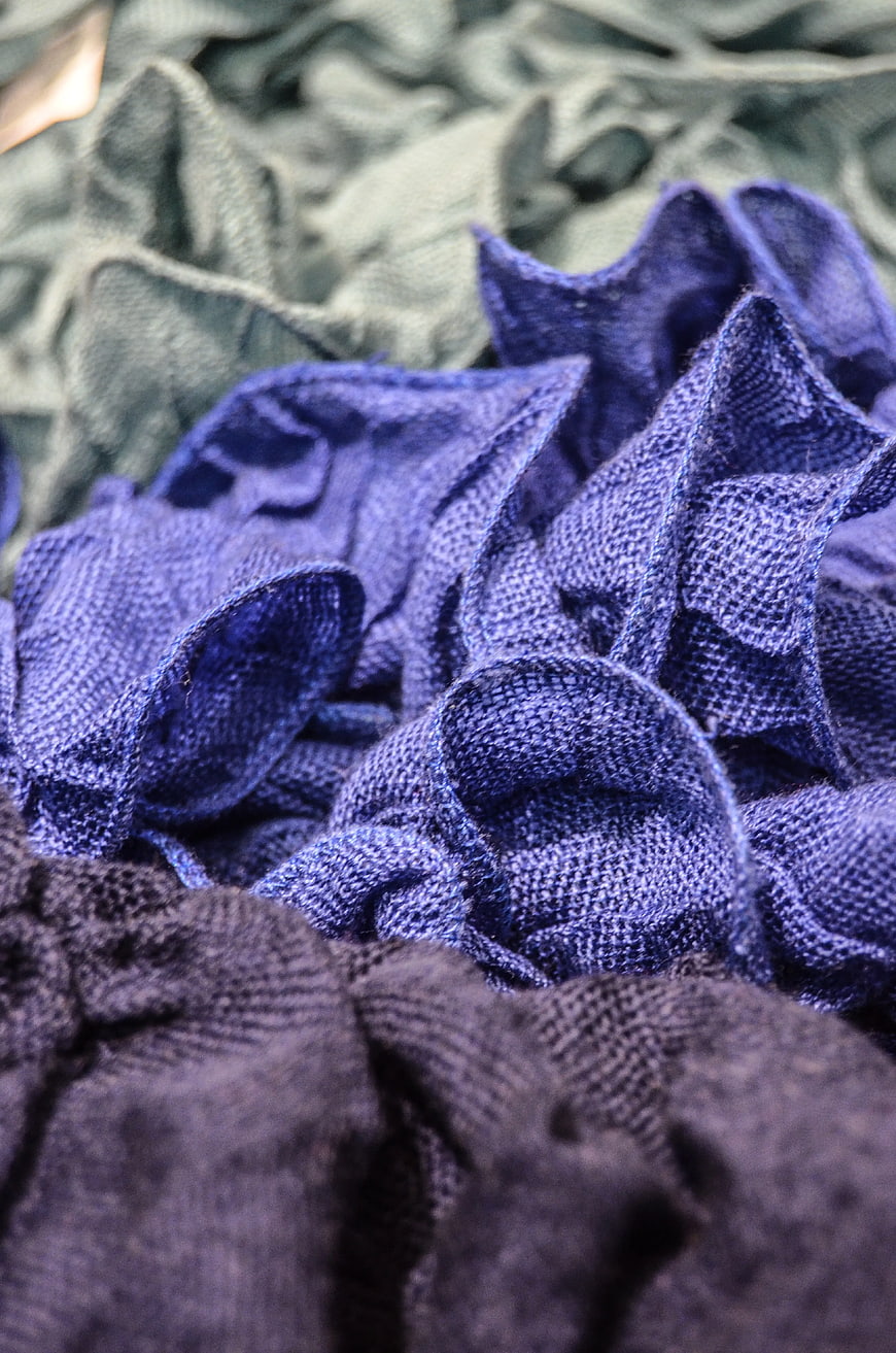 Close-up of purple and gray textured mesh fabric layers