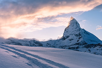 Matterhorn Mountain Peak at Sunset with Snowy Foreground