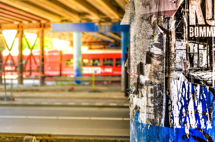 Grunge urban texture with blurred red train background