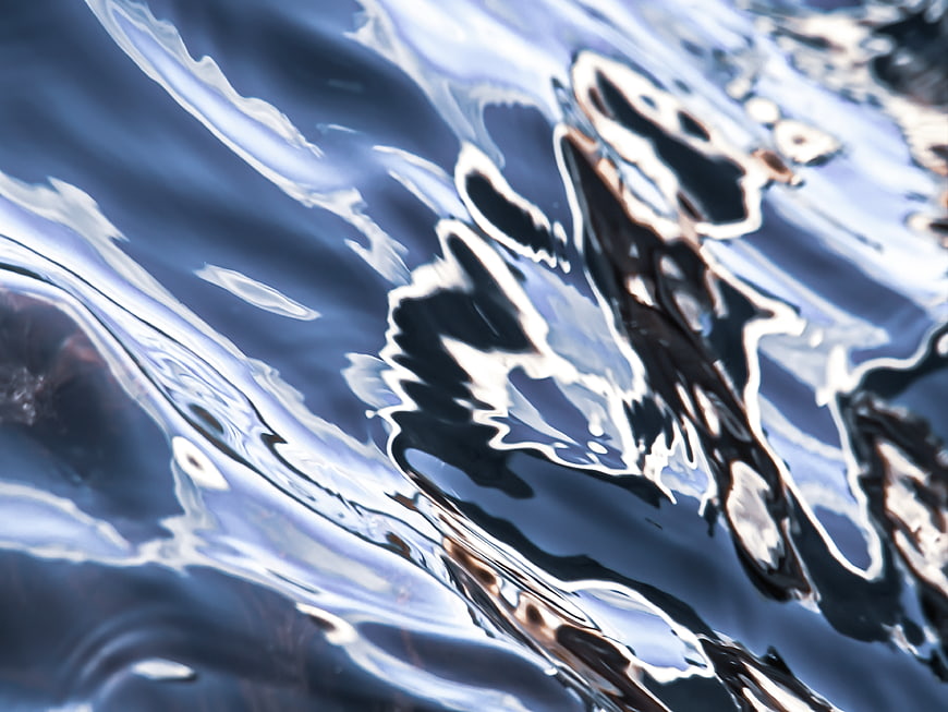 Abstract Blue Water Ripples and Reflections Texture