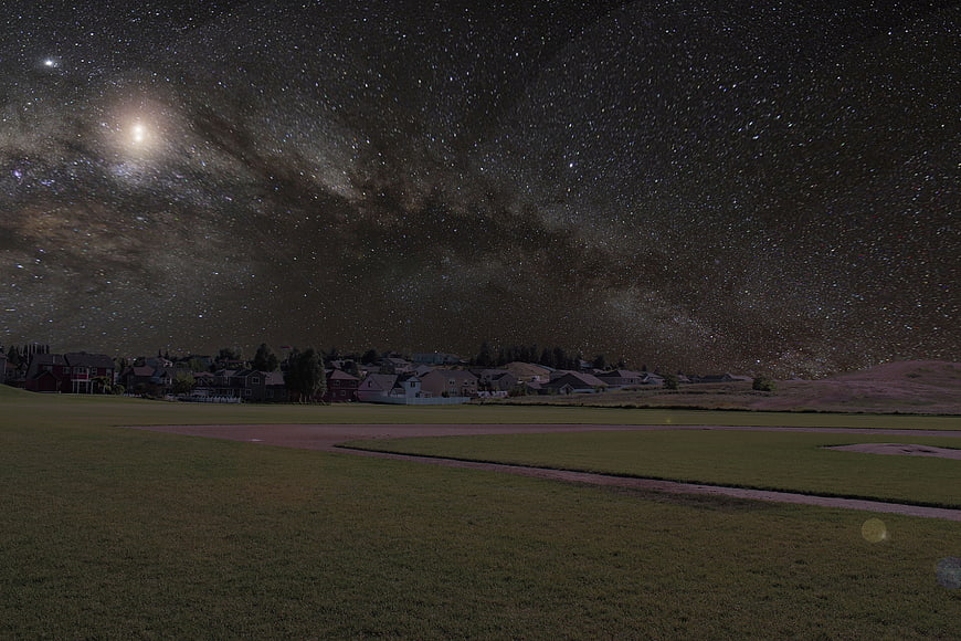 Milky Way Galaxy Over Suburban Neighborhood at Night