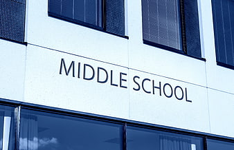 Middle School Building Exterior With Modern Architecture And Blue Tint