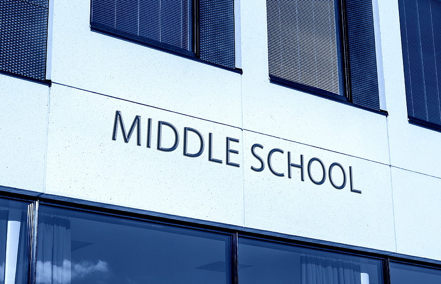 Middle School Building Exterior With Modern Architecture And Blue Tint