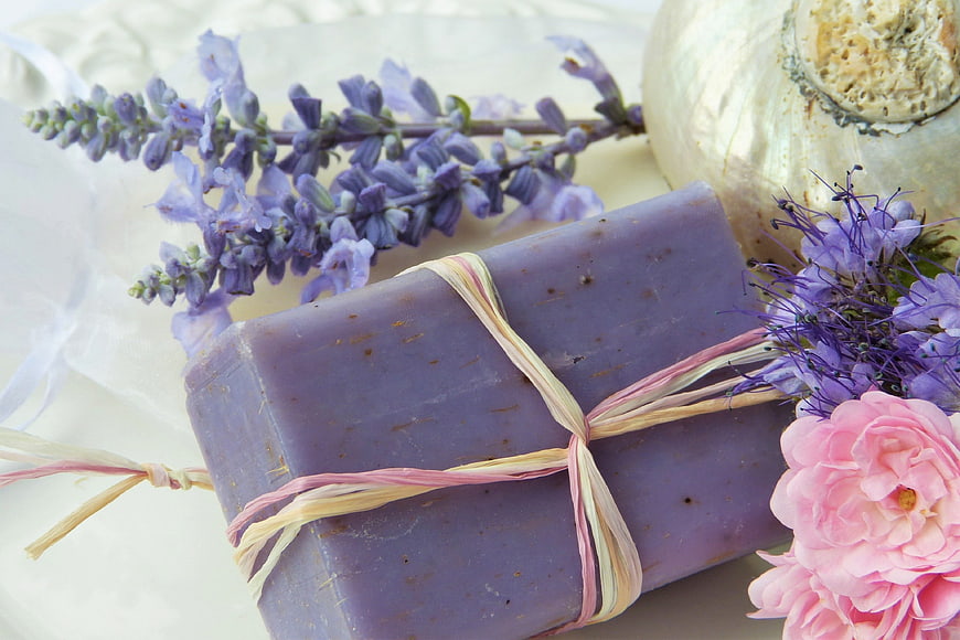 Handmade purple lavender soap with flowers and shell
