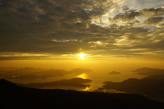 Golden sunrise over Hong Kong islands and ocean