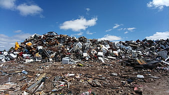 Massive pile of scrap metal and junk in a recycling yard