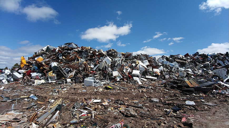Massive pile of scrap metal and junk in a recycling yard