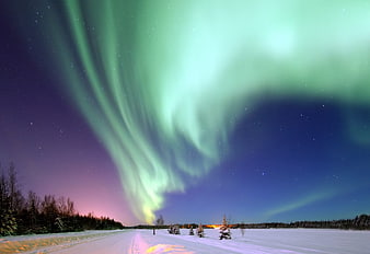 Vibrant Aurora Borealis Over Snowy Winter Road