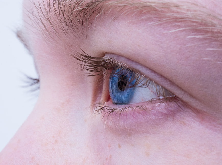 Extreme Macro Close-Up of Blue Eye and Eyelashes