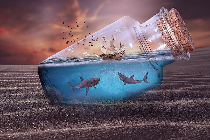 Conceptual 3D render of a ship and sharks inside a glass bottle on a beach