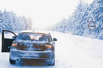 BMW 116i Stuck on Snowy Winter Road with Open Door
