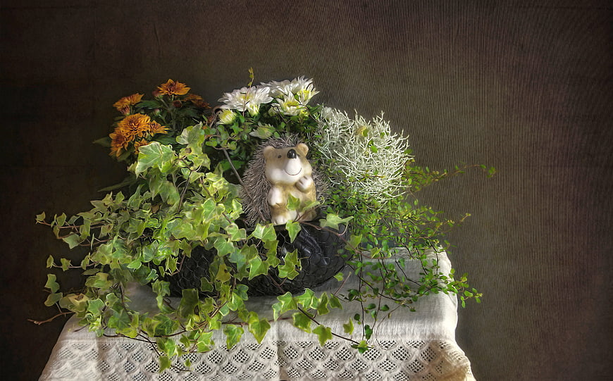Rustic Hedgehog Figurine in Floral Basket with Ivy