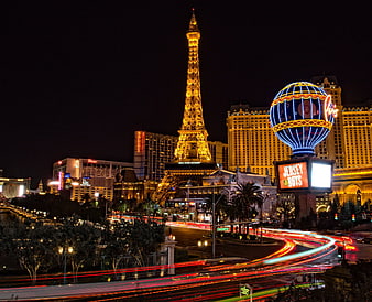 Las Vegas Strip Night Skyline with Eiffel Tower Replica and Light Trails