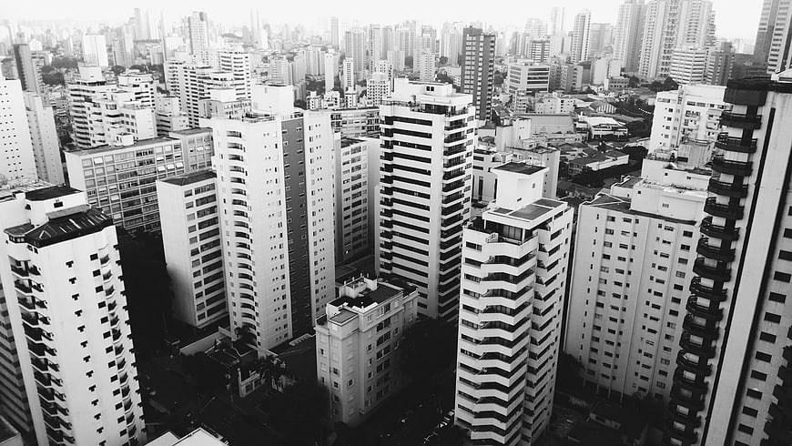 Black and white aerial view of dense urban cityscape