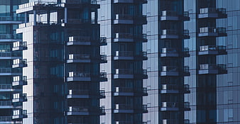 Modern Glass Apartment Building Facade with Balconies