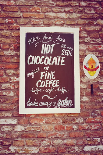 Vintage Chalkboard Menu For Hot Chocolate And Fine Coffee On Brick Wall