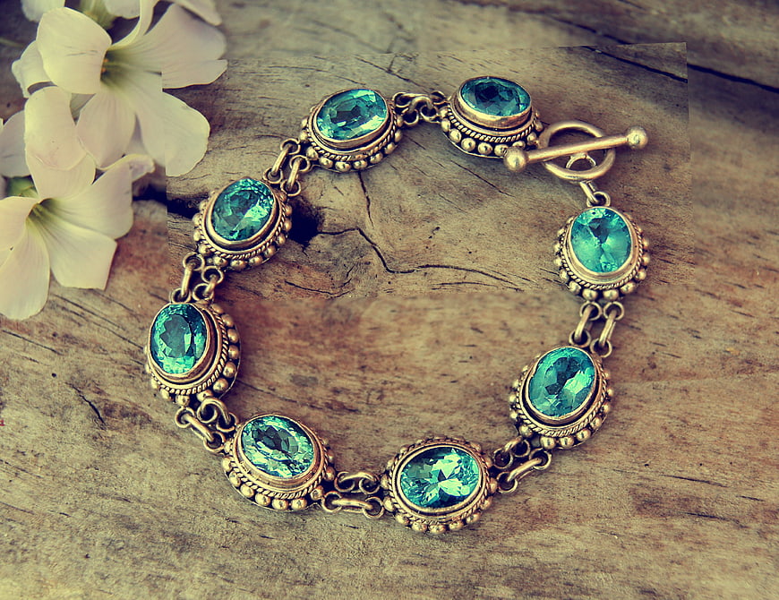 Vintage turquoise gemstone bracelet on rustic wood