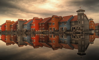 Colorful Dutch Houses Reflected in Calm Water