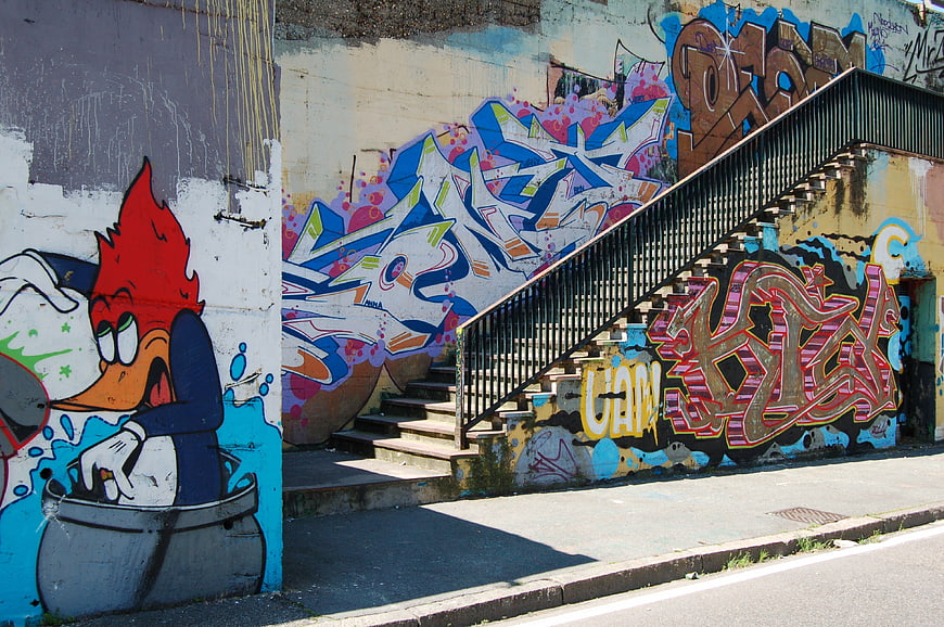 Colorful Woodstock Graffiti Mural on Urban Staircase Wall