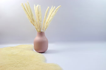 Minimalist Pink Vase with Dried Pampas Grass on Yellow Fur