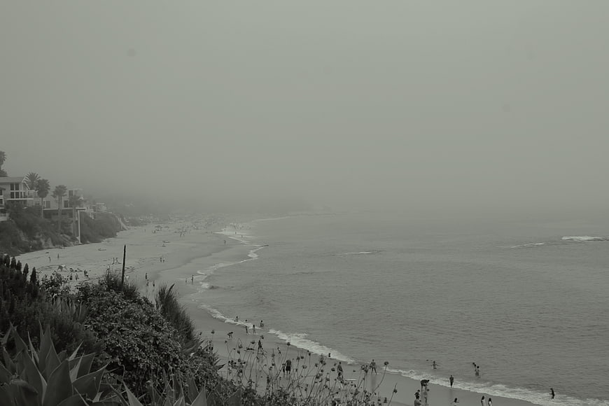 Foggy Black and White Coastal Beach Landscape with People