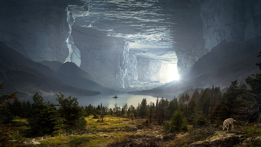 Mystical fantasy landscape with deer and glowing cave portal