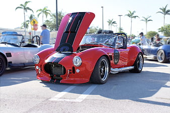 Red Classic Cobra Sports Car with Open Hood