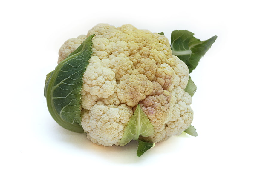 Fresh Whole Cauliflower Head With Green Leaves On White Background