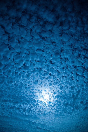 Dramatic Blue Mackerel Sky with Bright Moonlight