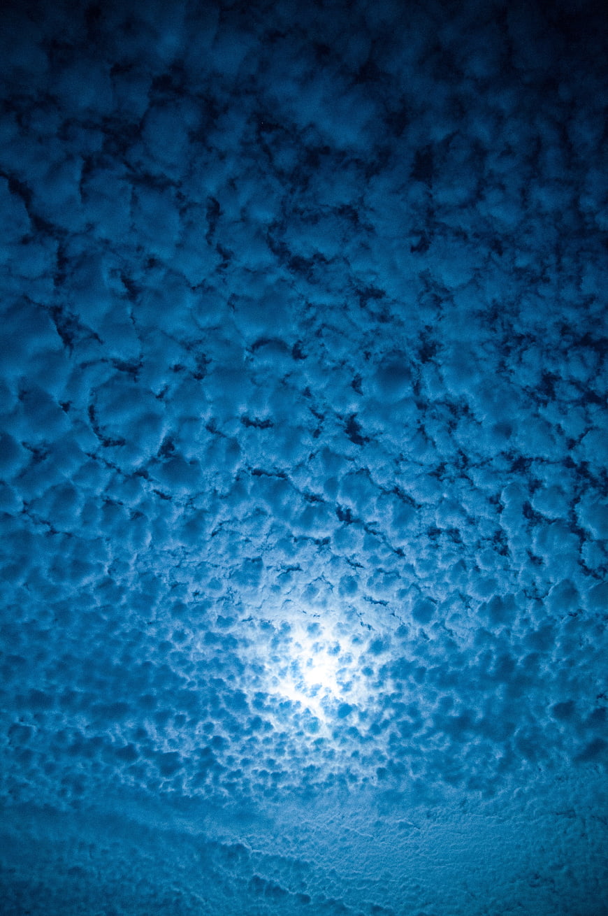 Dramatic Blue Mackerel Sky with Bright Moonlight