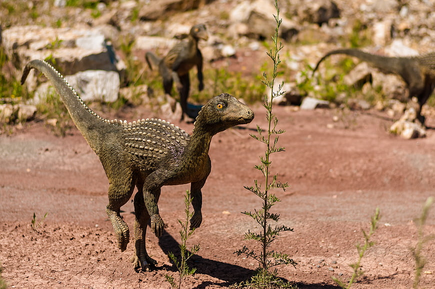 Realistic Dinosaur Model in Prehistoric Park Landscape