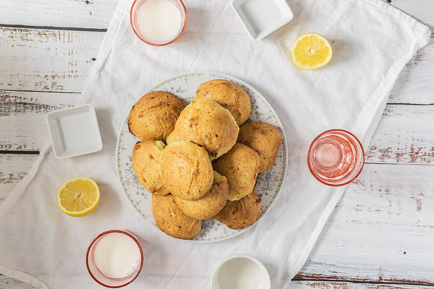 Top view of homemade lemon cheese cookies on a rustic table