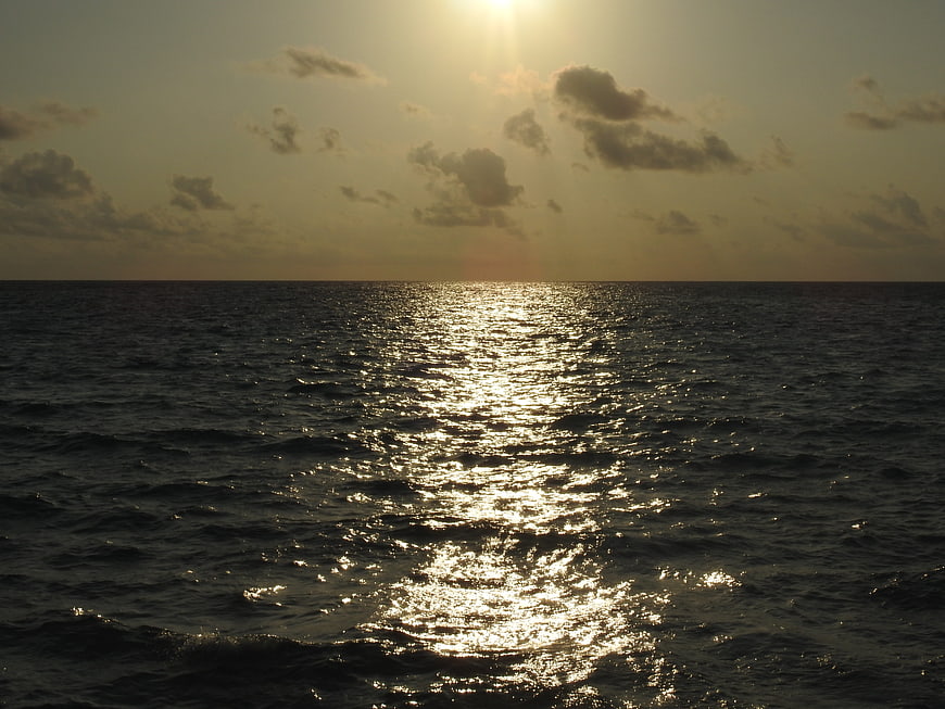 Golden Sunset Reflection on Ocean Waves