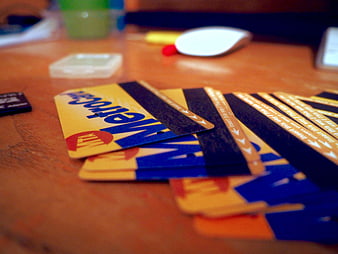 Close-up of Metrocard tickets on wooden table