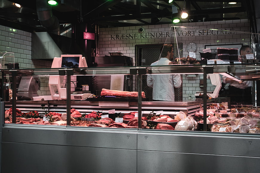 Fresh meat display in a modern butcher shop counter