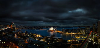 Dramatic Night Panorama of Sydney Opera House and Harbour Bridge