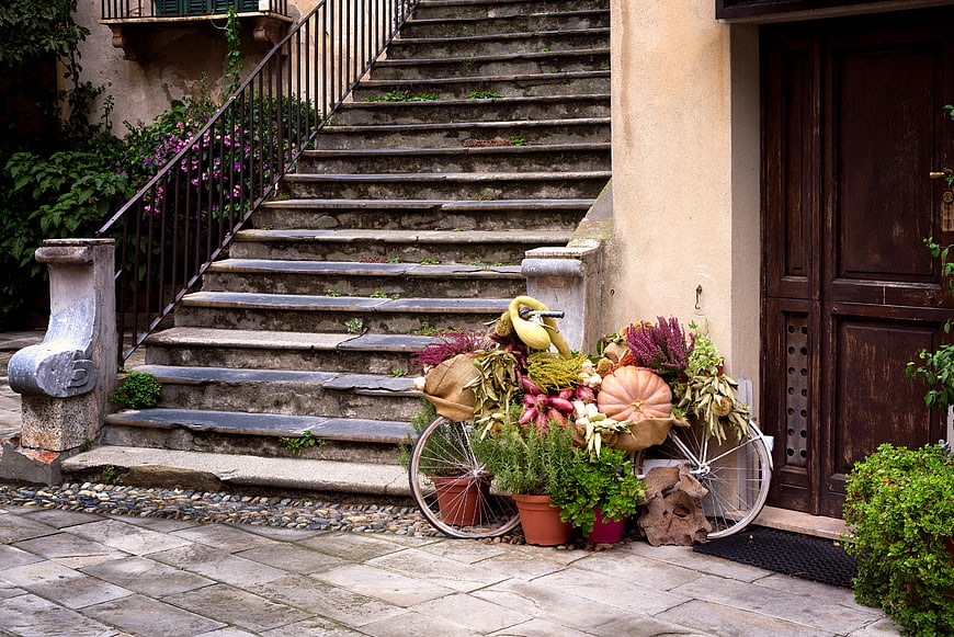 Autumn Harvest Bicycle Display on Stone Steps