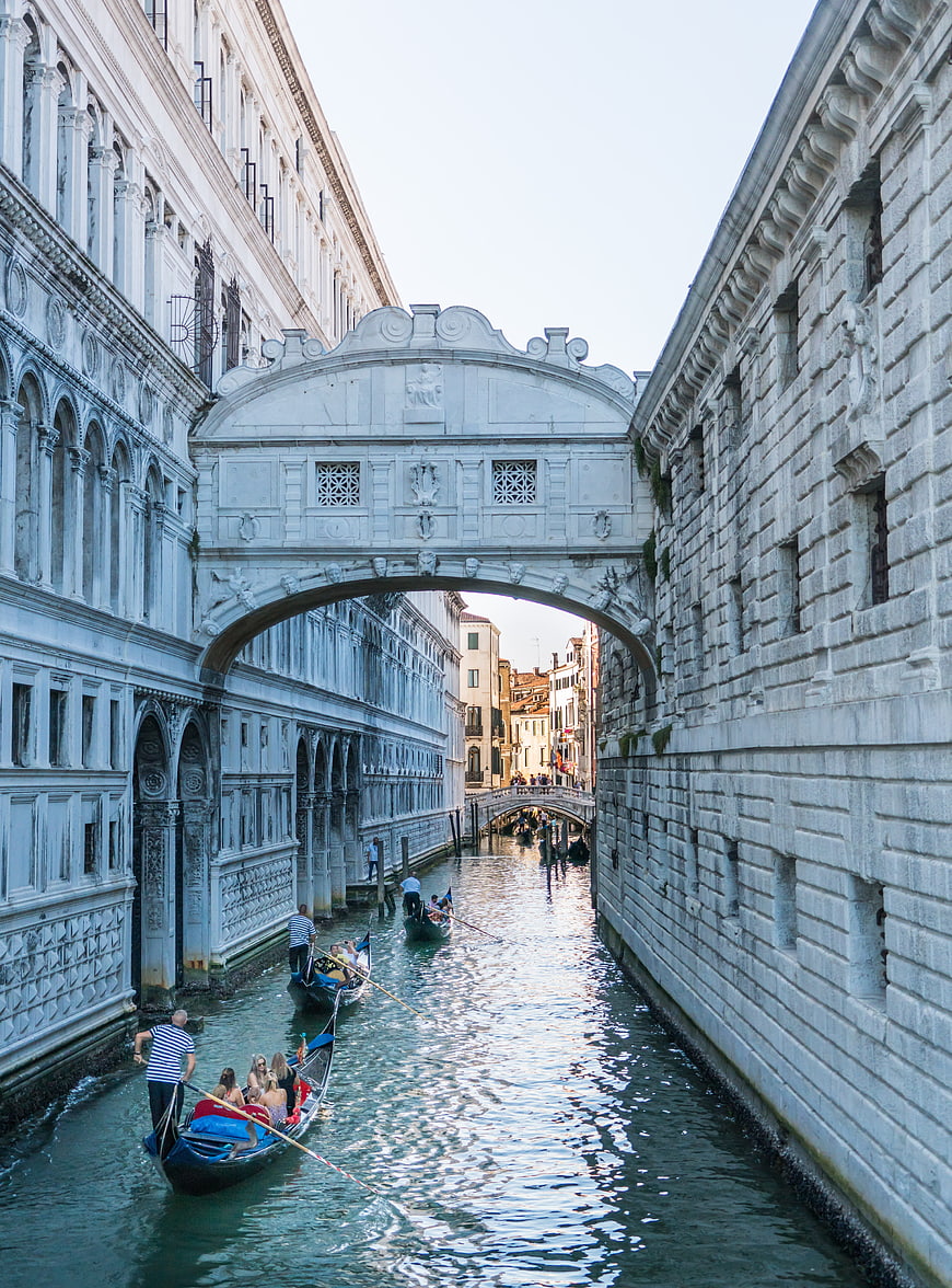 Gondolas passing under the Bridge of Sighs in Venice