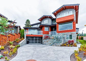 Modern Two-Story House with Red Cedar and Stone Facade