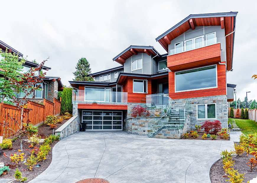 Modern Two-Story House with Red Cedar and Stone Facade