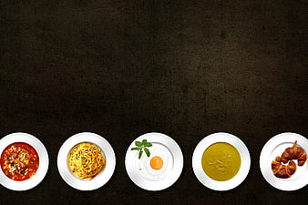 Overhead View of Five Diverse Dishes on Dark Background