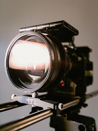 Close-up of vintage film camera lens on slider