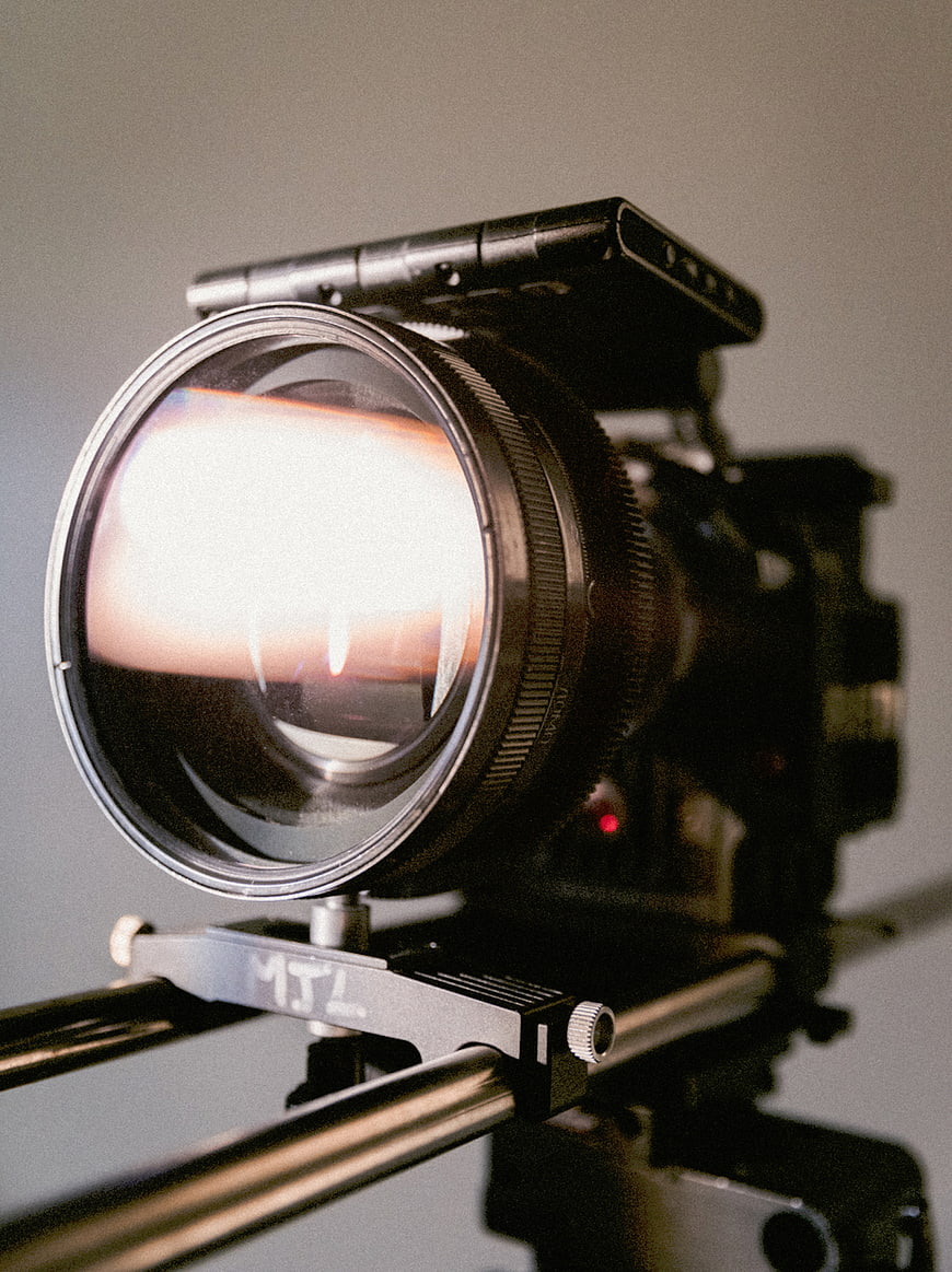Close-up of vintage film camera lens on slider