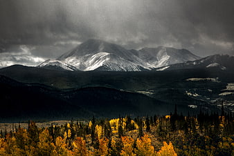 Dramatic Autumn Mountain Landscape with Golden Aspen Trees